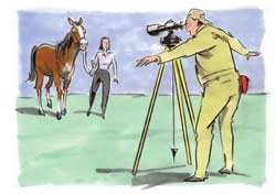 Picture of man looking at horse through a scope